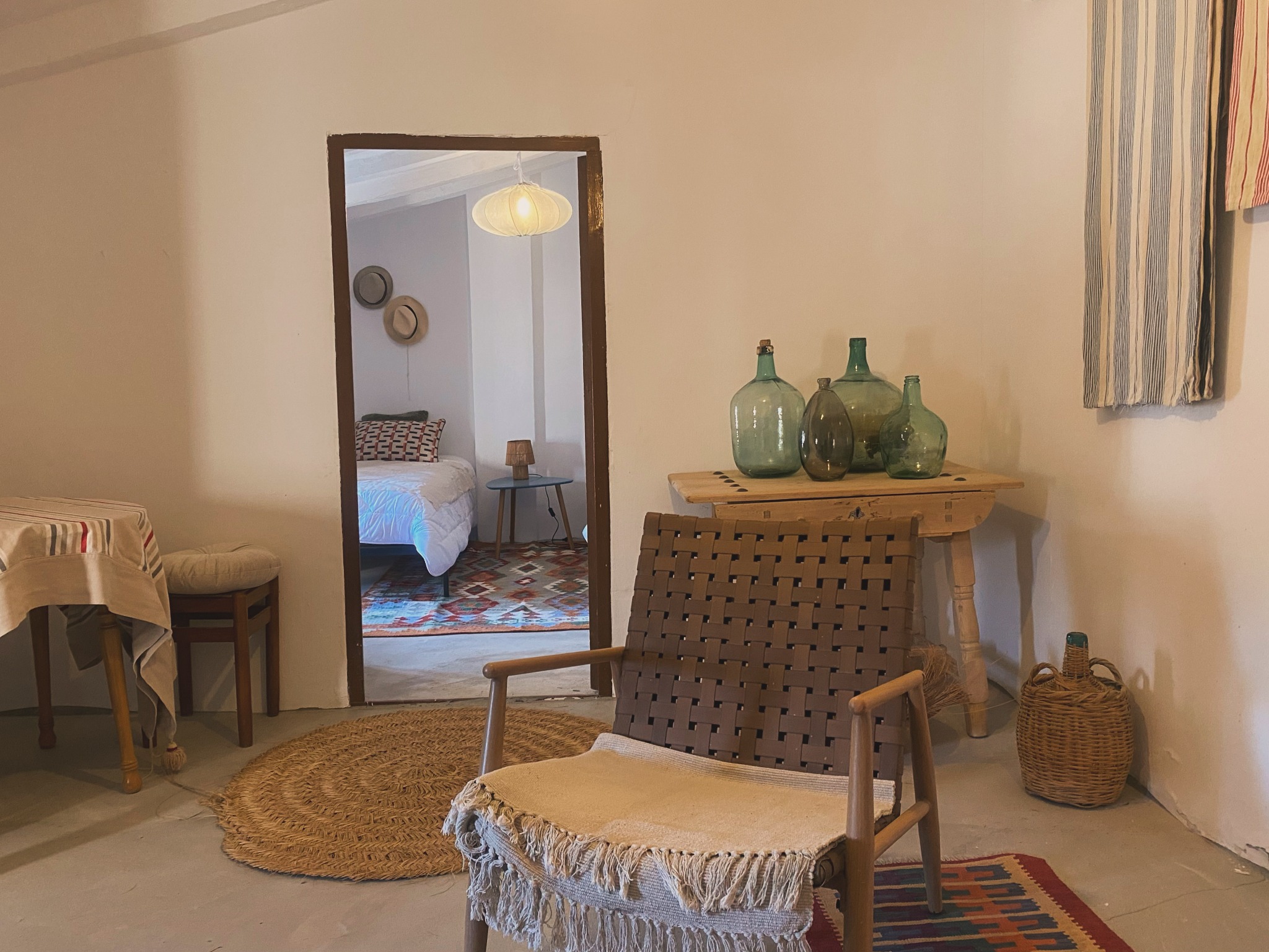 The Travellers’ Suite lounge, with a view through to the twin bedroom
